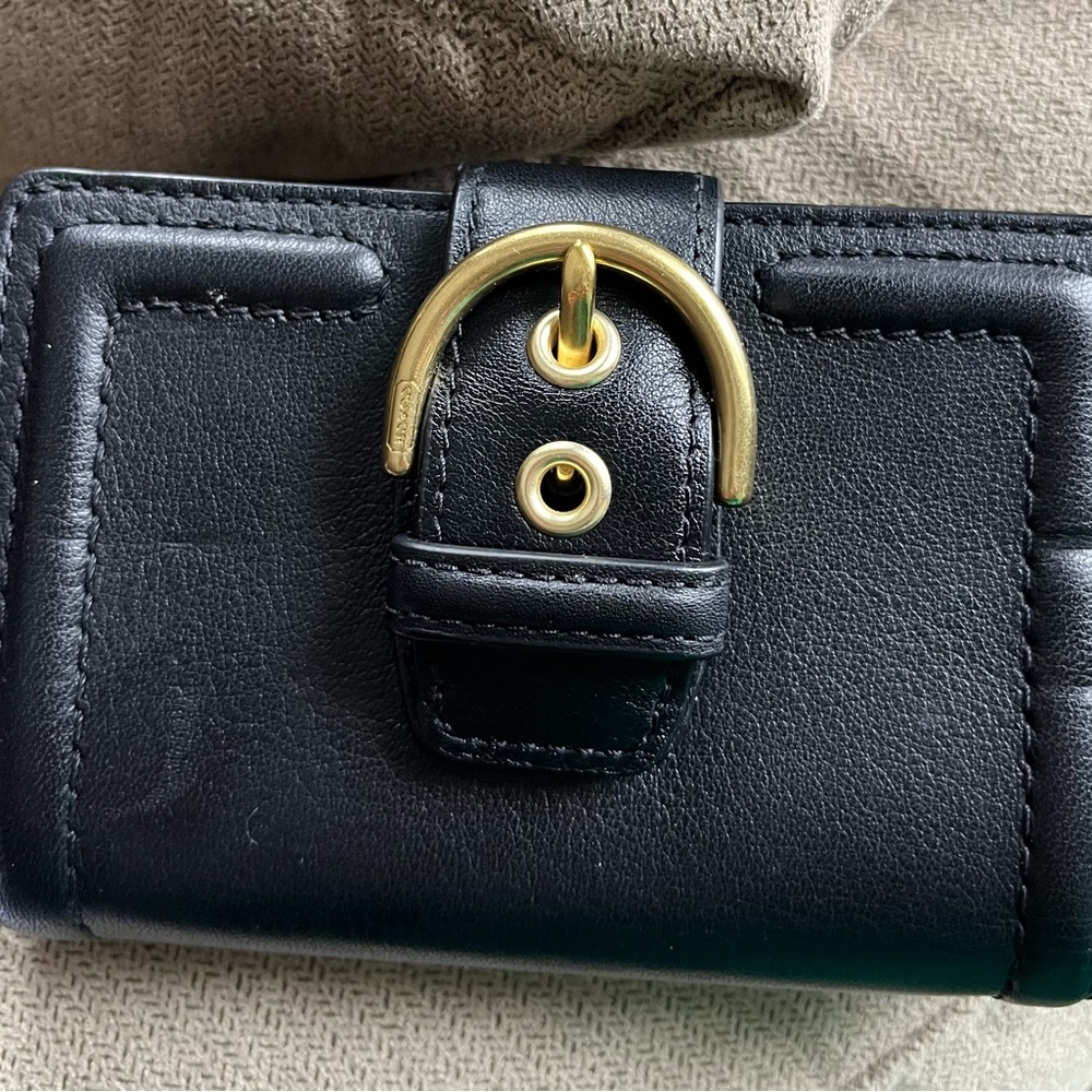 Coach buckle wallet.